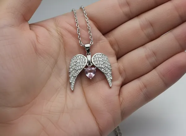 Angel_Wings_Foldable_Pendant_Necklace_With_Pink_Heart_925_Sterling_Silver